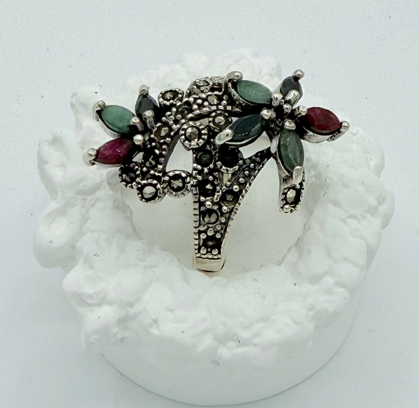 inlaid with. natural Ruby, emerald stone