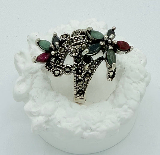 inlaid with. natural Ruby, emerald stone