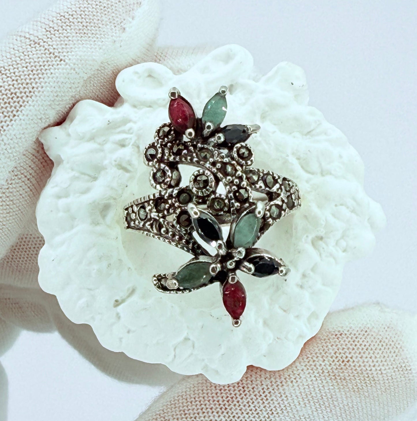 inlaid with. natural Ruby, emerald stone