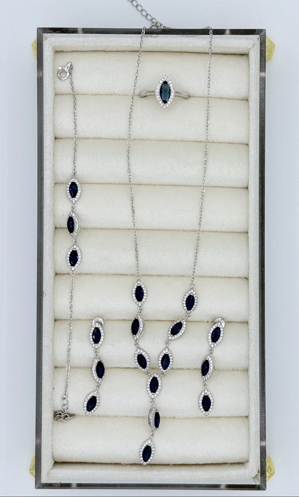 Whole set 925 Sterling Silver Stone is cubic zirconia natural sapphire.