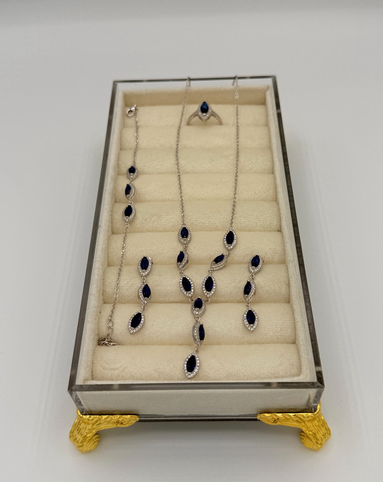 Whole set 925 Sterling Silver Stone is cubic zirconia natural sapphire.